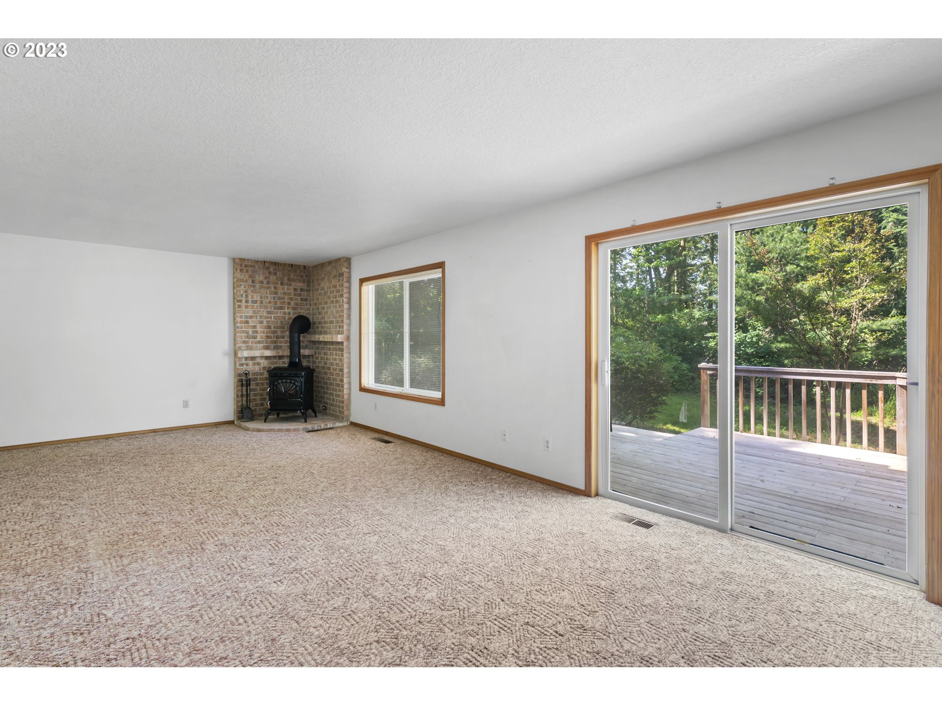 29510 Northwest 63rd Avenue Ridgefield, WA 98642 - Photo 17 of 38 a view of empty room with floor to ceiling window