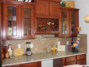 226 State Rd S-29-804 Fort Mill, SC 29707 - Photo 3 of 16 a kitchen with granite countertop a sink and cabinets