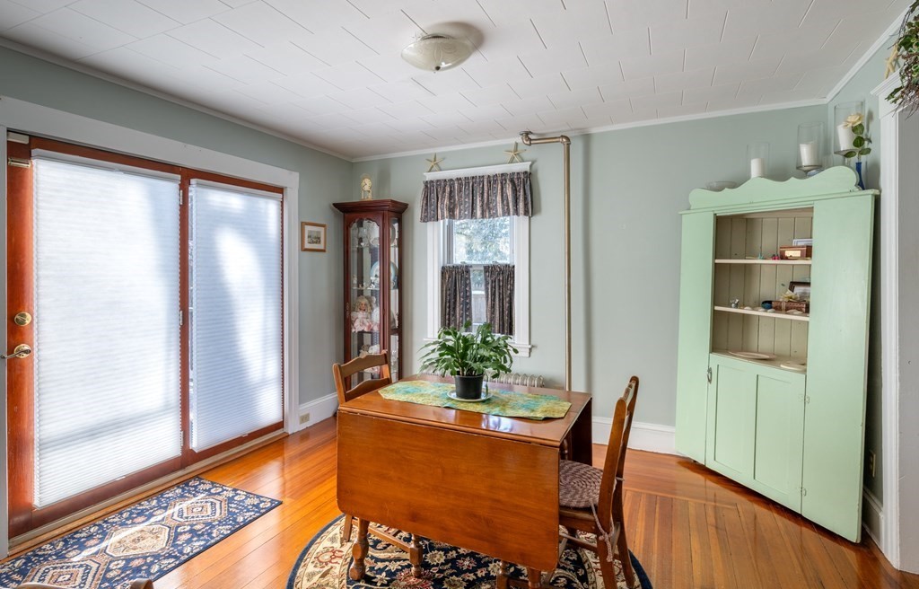 61 Bridge Road Northampton, MA 01062 - Photo 12 of 34 a view of a dining room with furniture window and wooden floor