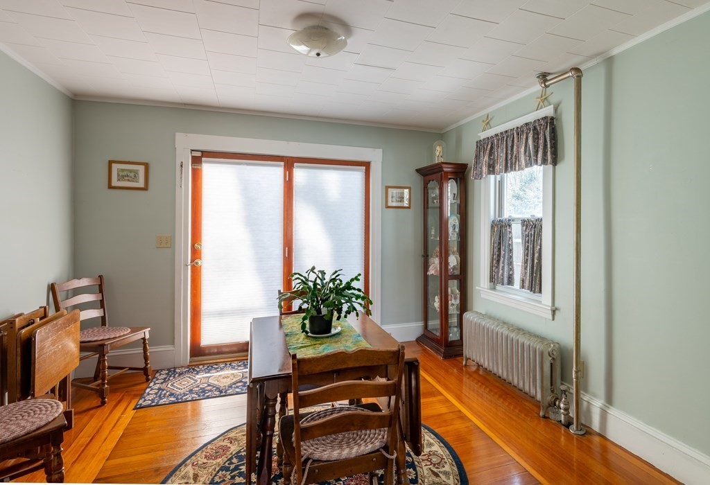 61 Bridge Road Northampton, MA 01062 - Photo 13 of 34 a living room with furniture and a potted plant