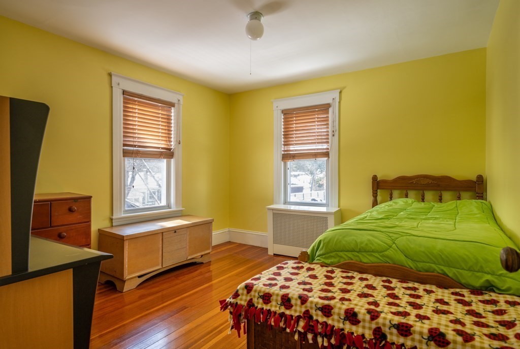61 Bridge Road Northampton, MA 01062 - Photo 20 of 34 a bedroom with a bed and a window