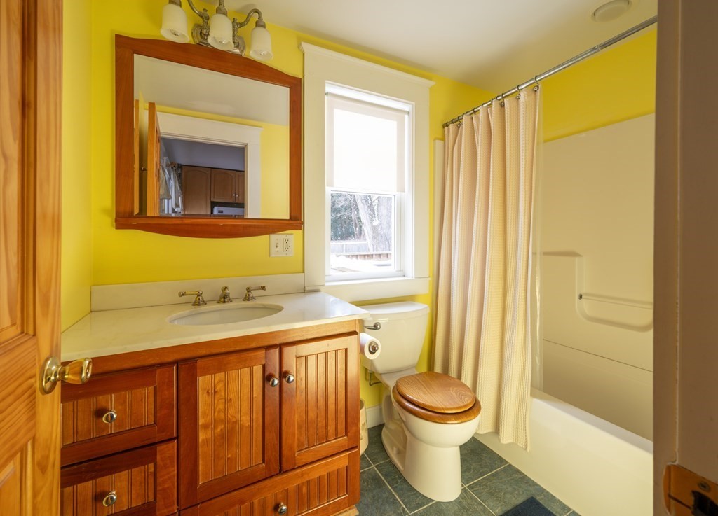 61 Bridge Road Northampton, MA 01062 - Photo 25 of 34 a bathroom with a toilet a sink and a shower