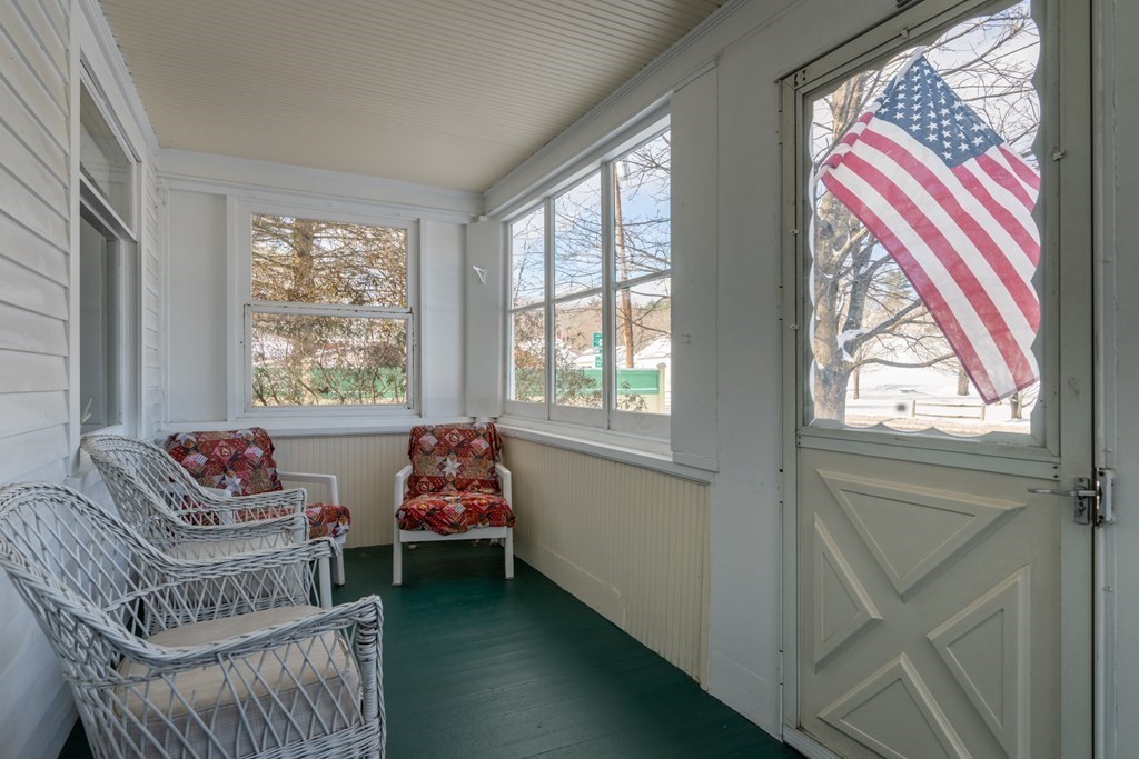 61 Bridge Road Northampton, MA 01062 - Photo 26 of 34 a living room with furniture and floor to ceiling windows