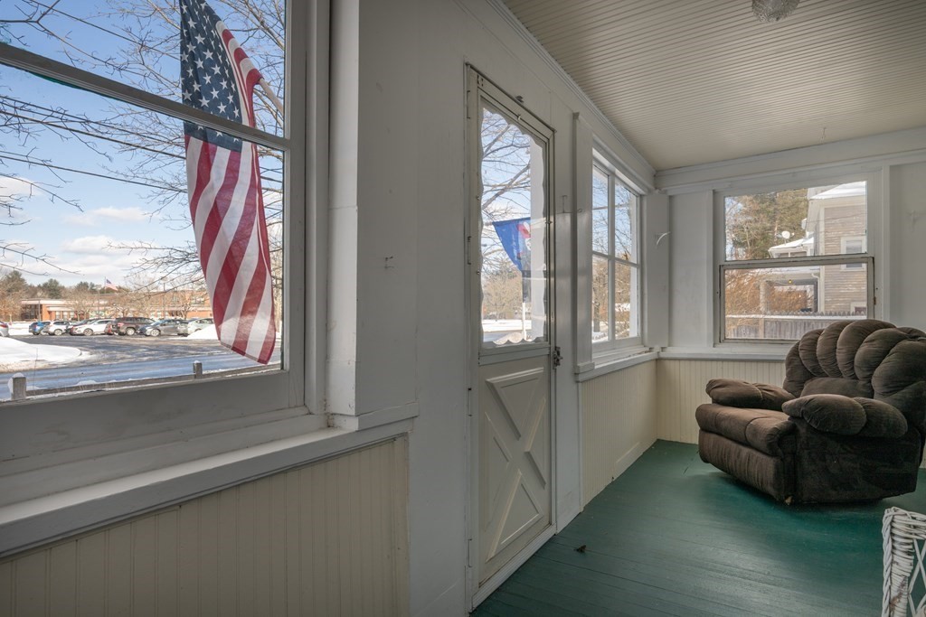 61 Bridge Road Northampton, MA 01062 - Photo 27 of 34 a living room with furniture and a floor to ceiling window