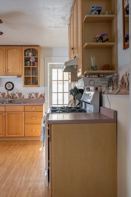 61 Bridge Road Northampton, MA 01062 - Photo 9 of 34 a kitchen with a sink and a stove top oven