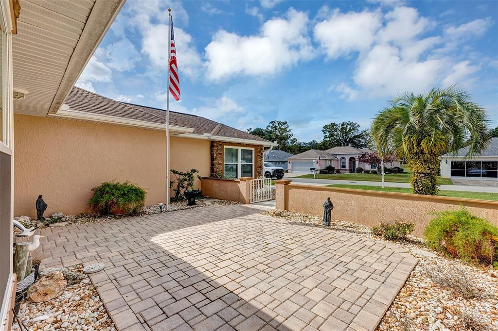 11447 Southwest 69th Circle Ocala, FL 34476 - Photo 4 of 32 a house view with a backyard space