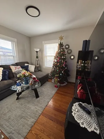 a bed room with furniture and a window