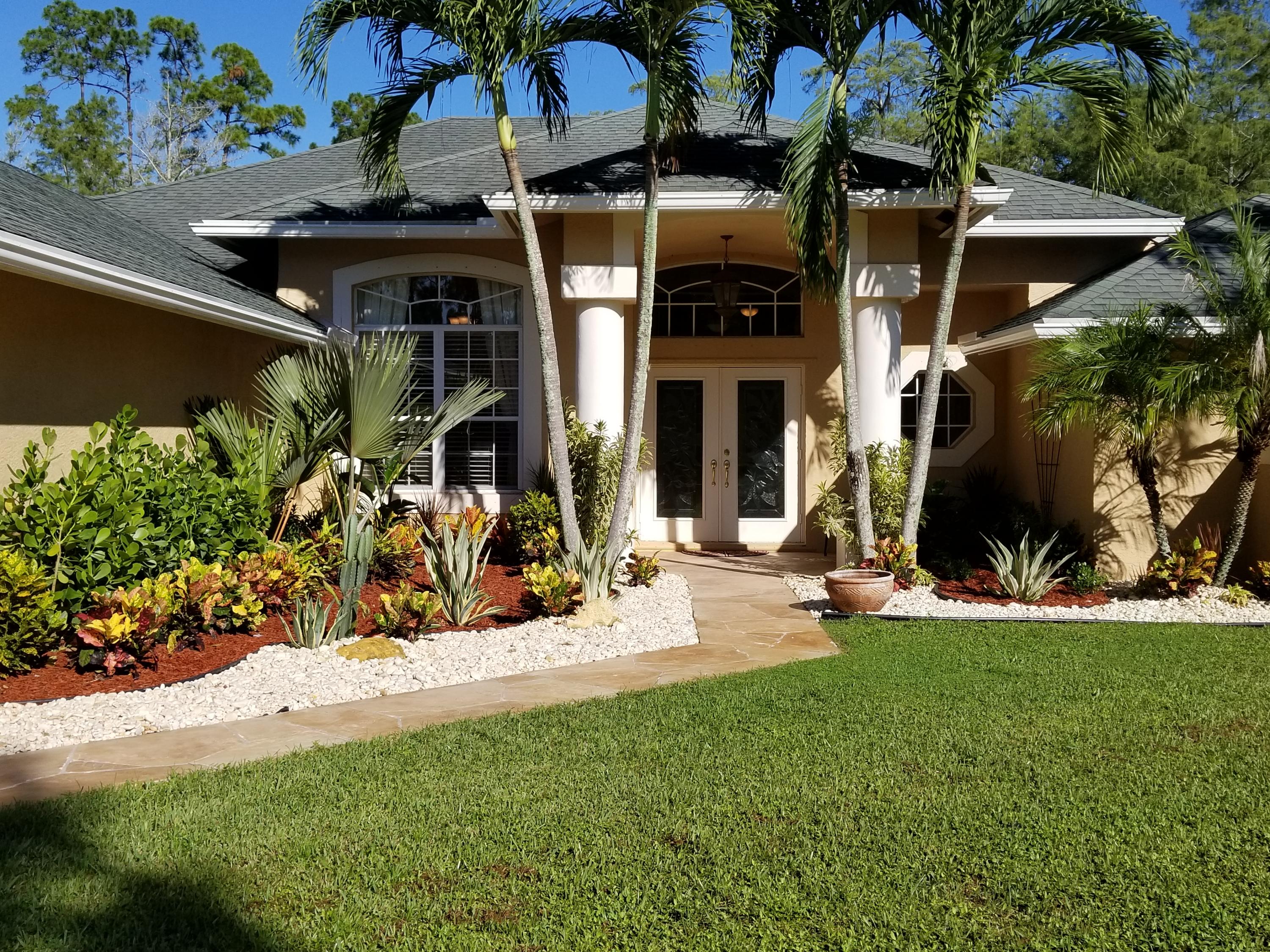 6037 Reynolds Road Lake Worth, FL 33449 - Photo 4 of 44 FRONT WALKWAY