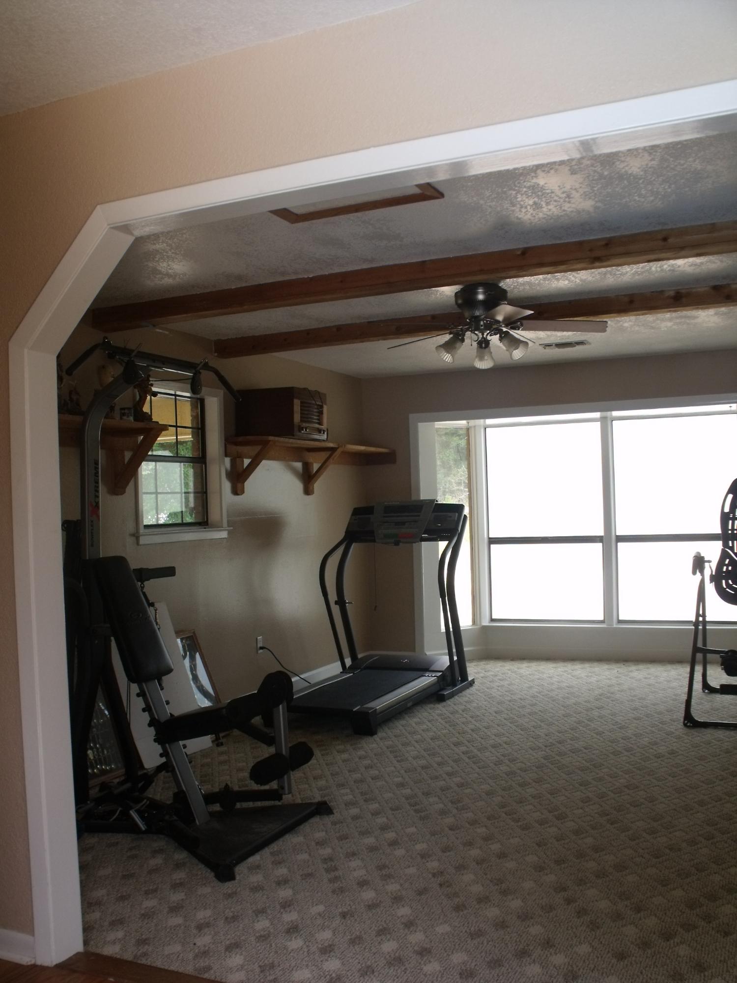 6047 Eden Square Crestview, FL 32539 - Photo 13 of 22 a view of a room with gym equipment