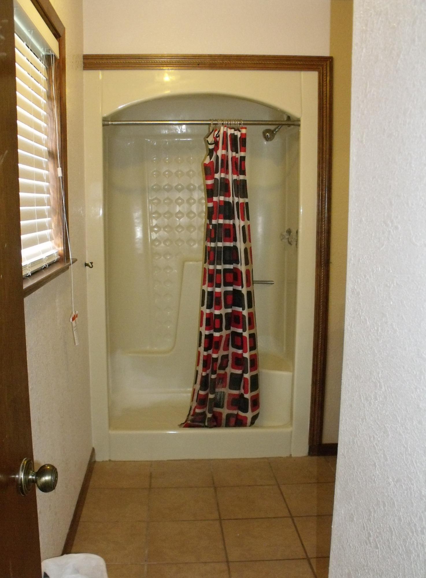 6047 Eden Square Crestview, FL 32539 - Photo 17 of 22 a view of bathroom with shower