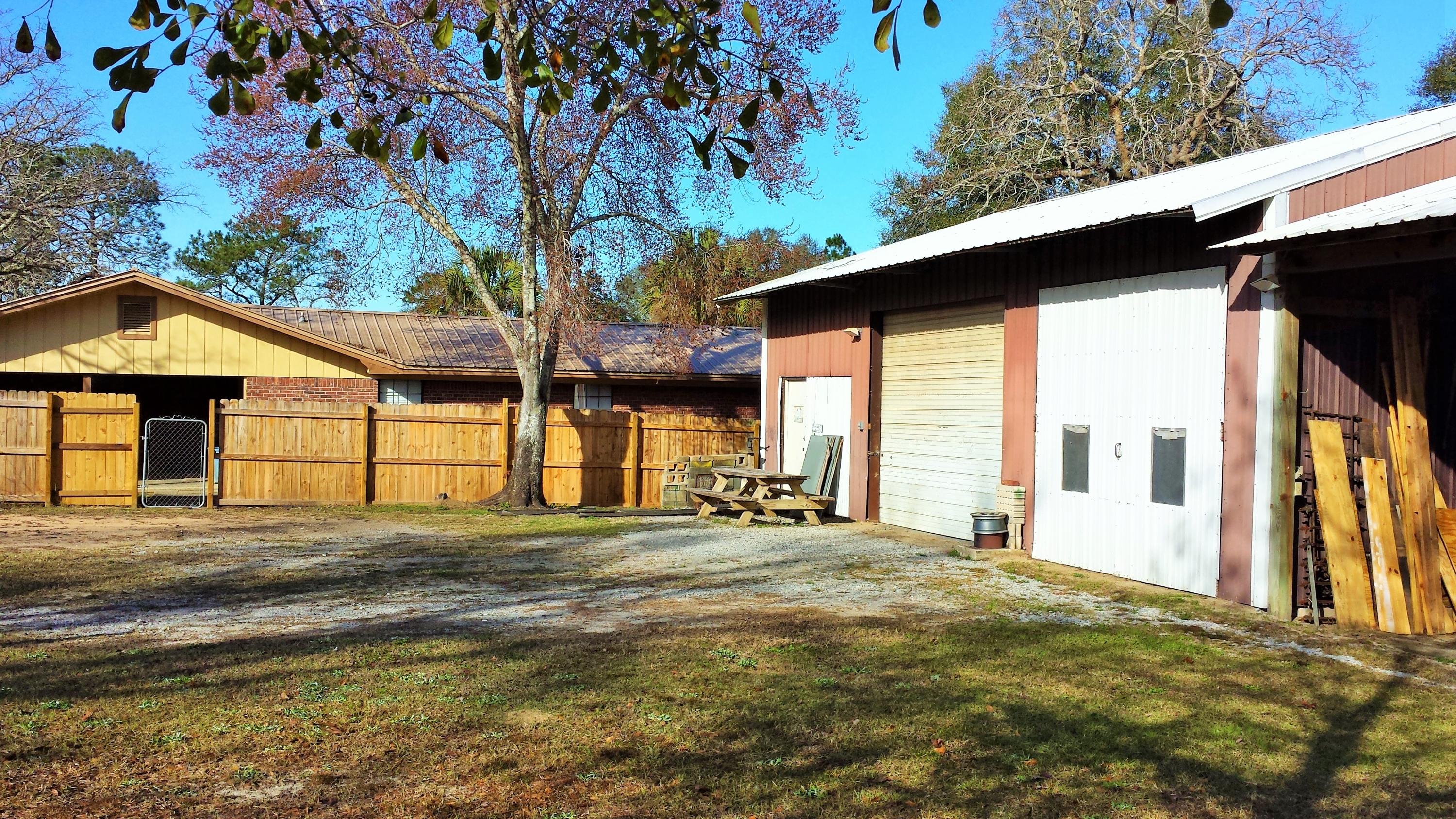 6047 Eden Square Crestview, FL 32539 - Photo 22 of 22 a view of a house with a outdoor space