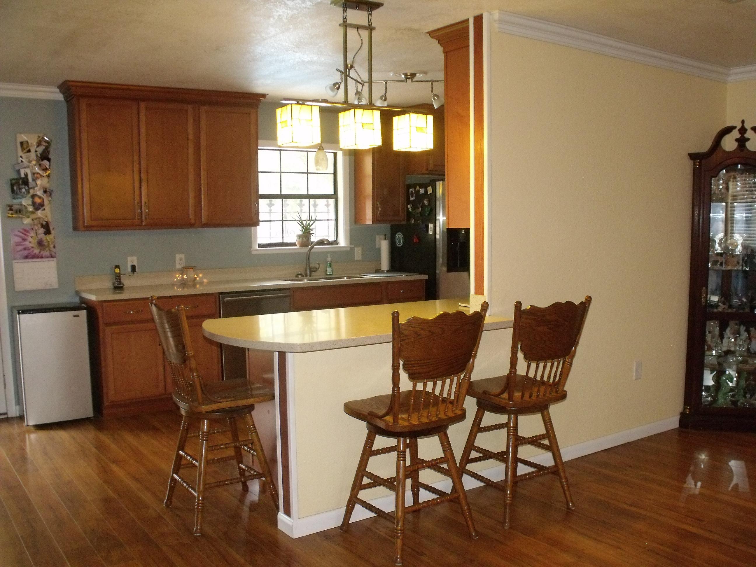 6047 Eden Square Crestview, FL 32539 - Photo 5 of 22 a view of a dining room with furniture and wooden floor