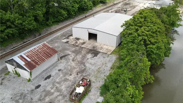 a view of a backyard with garden