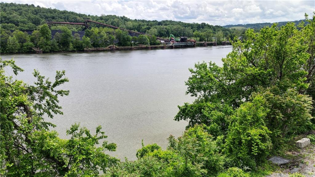 736 Front Street Fredericktown, PA 15333 - Photo 16 of 41 an aerial view of green landscape with trees houses and lake view