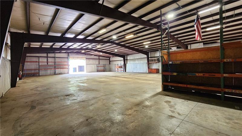 736 Front Street Fredericktown, PA 15333 - Photo 18 of 41 a view of an empty room with wooden floor