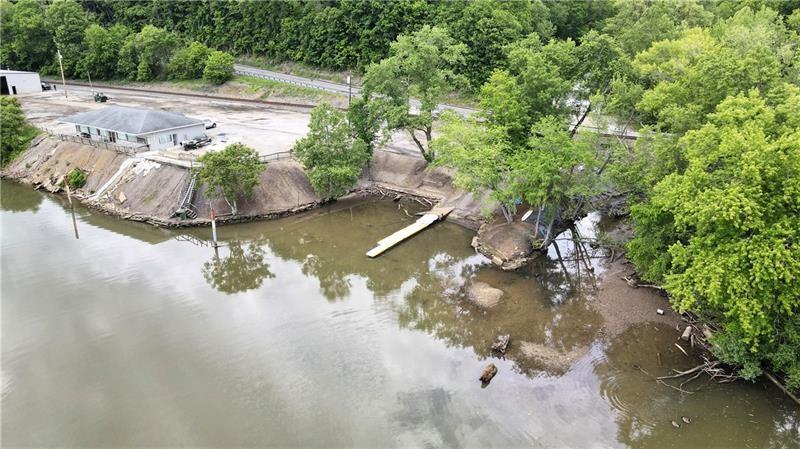 736 Front Street Fredericktown, PA 15333 - Photo 20 of 41 a view of a lake with a house