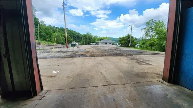 a view of a backyard of the house