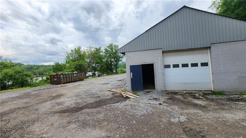736 Front Street Fredericktown, PA 15333 - Photo 23 of 41 a view of a house with backyard and garden