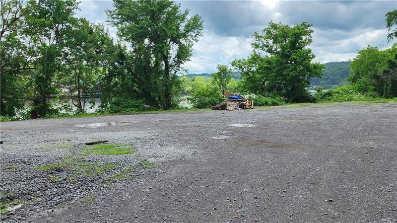 736 Front Street Fredericktown, PA 15333 - Photo 26 of 41 a view of a field with trees in the background