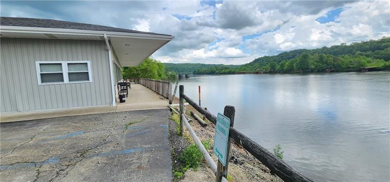 736 Front Street Fredericktown, PA 15333 - Photo 30 of 41 a house with a lake view