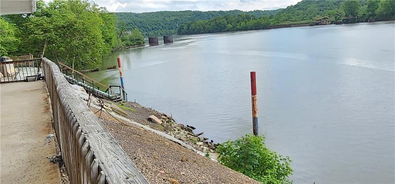 736 Front Street Fredericktown, PA 15333 - Photo 31 of 41 a view of a lake with a bridge