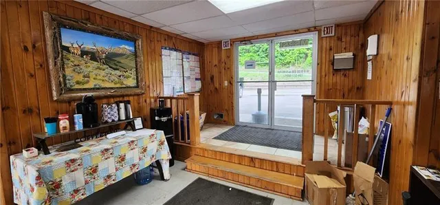 a bedroom with furniture and window