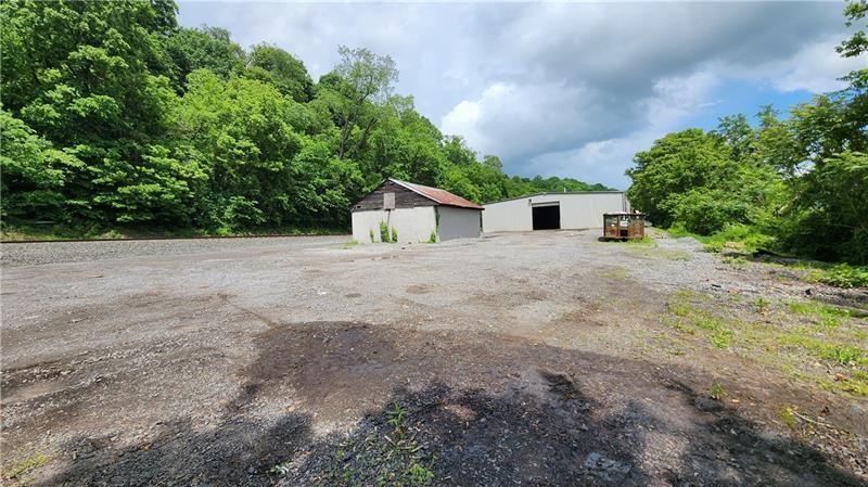 736 Front Street Fredericktown, PA 15333 - Photo 37 of 41 a view of a house with a yard