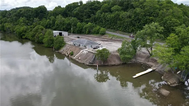 a view of a lake with a yard