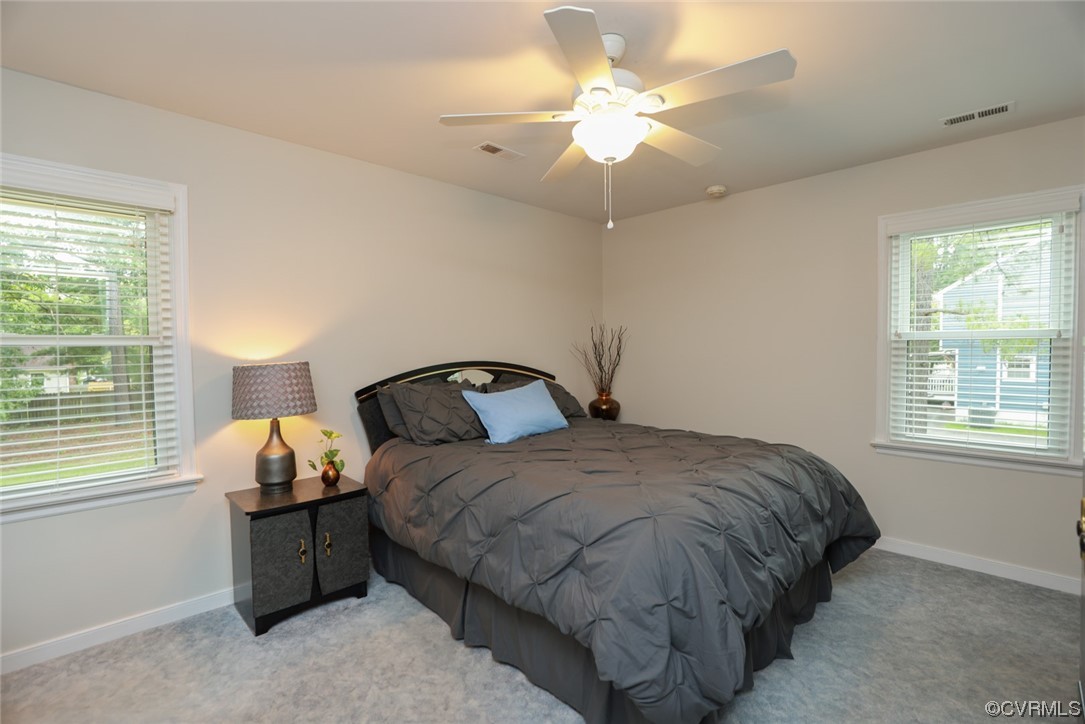 5036 Rollingway Road Chesterfield, VA 23832 - Photo 26 of 42 a bedroom with bed and window