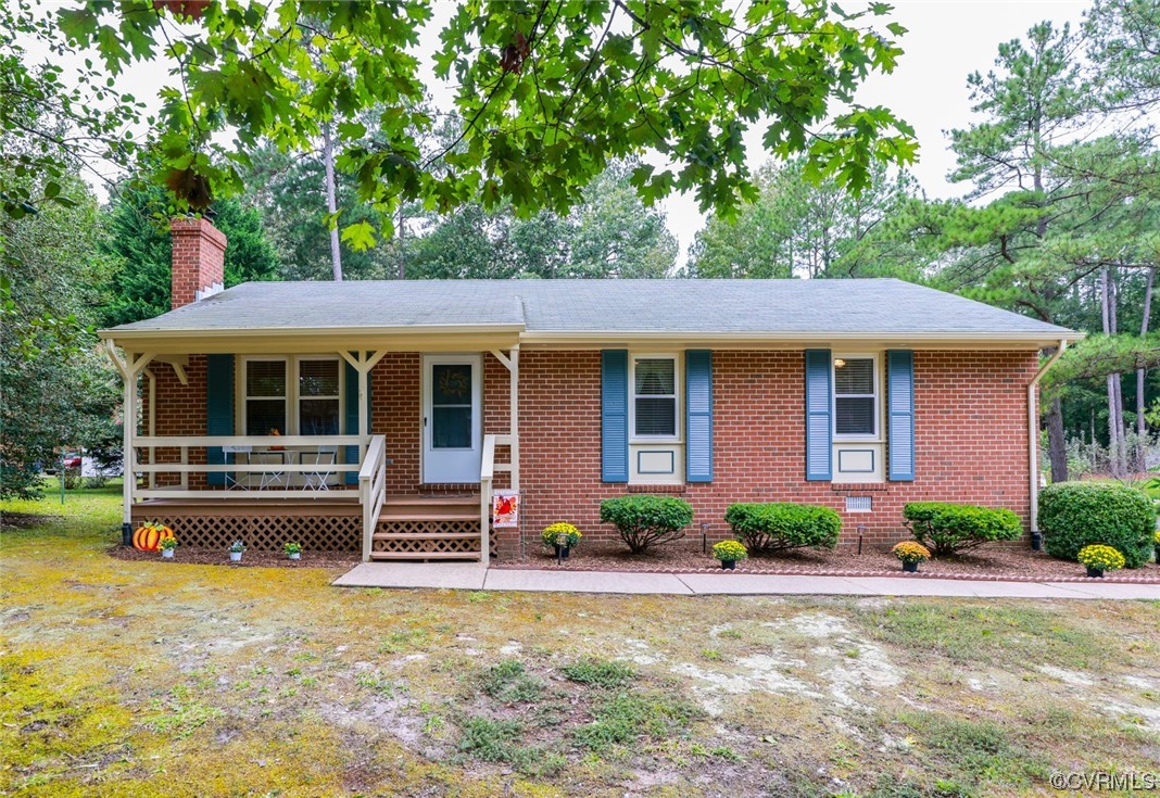 5036 Rollingway Road Chesterfield, VA 23832 - Photo 3 of 42 a front view of a house with a porch