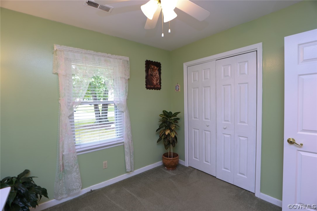 5036 Rollingway Road Chesterfield, VA 23832 - Photo 34 of 42 wooden floor in an empty room with a window