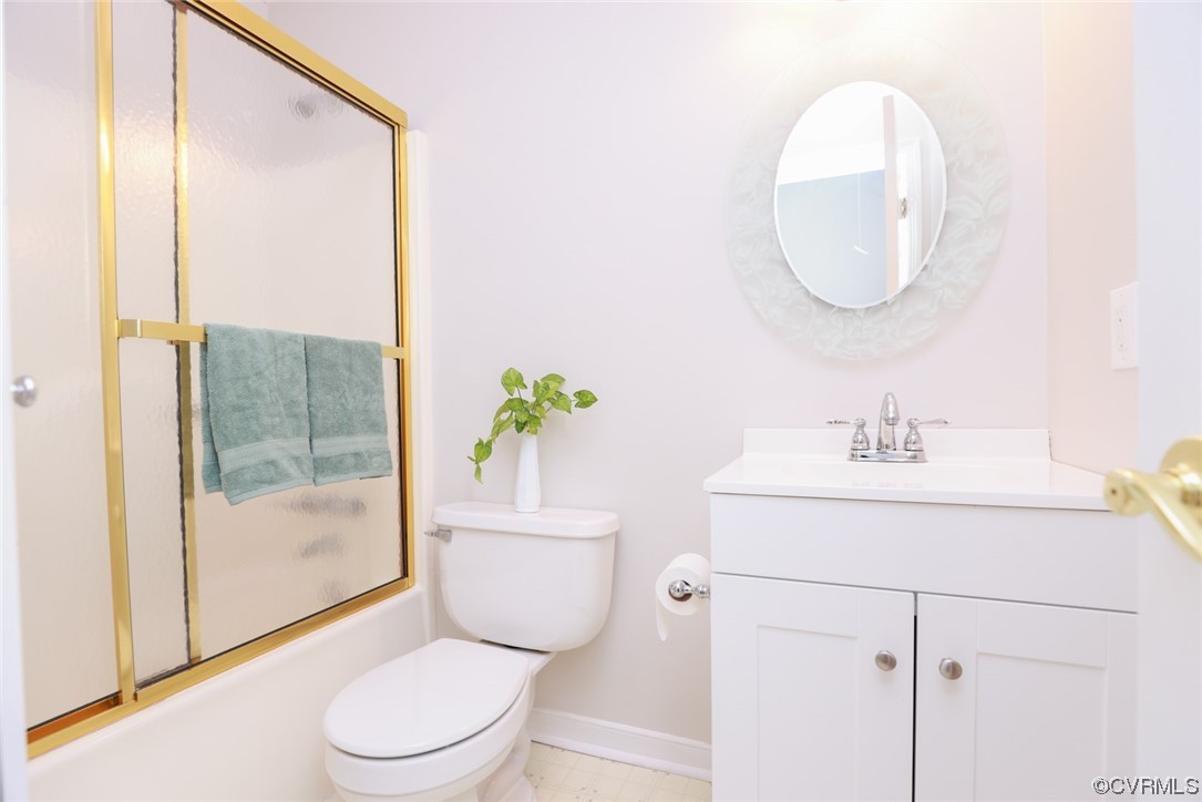 5036 Rollingway Road Chesterfield, VA 23832 - Photo 36 of 42 a white toilet sitting next to a bathroom sink