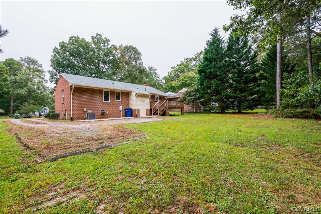 5036 Rollingway Road Chesterfield, VA 23832 - Photo 38 of 42 a front view of house with yard and green space