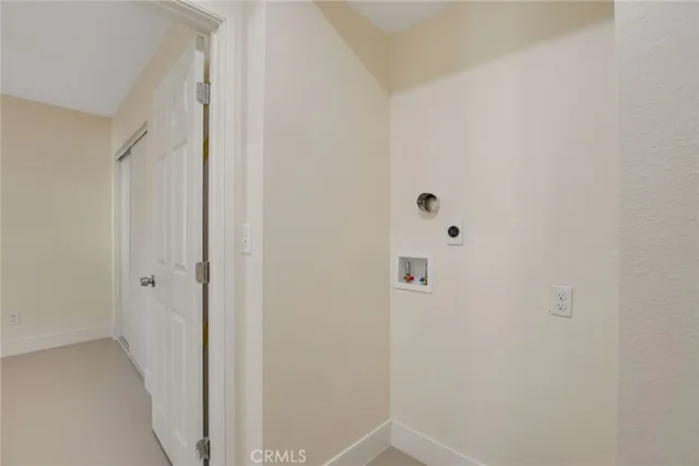 a bathroom with a shower a toilet and sink