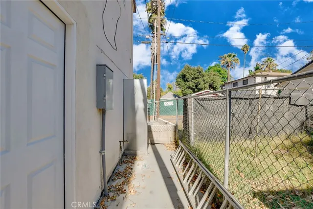 a backyard of a house with yard and garage
