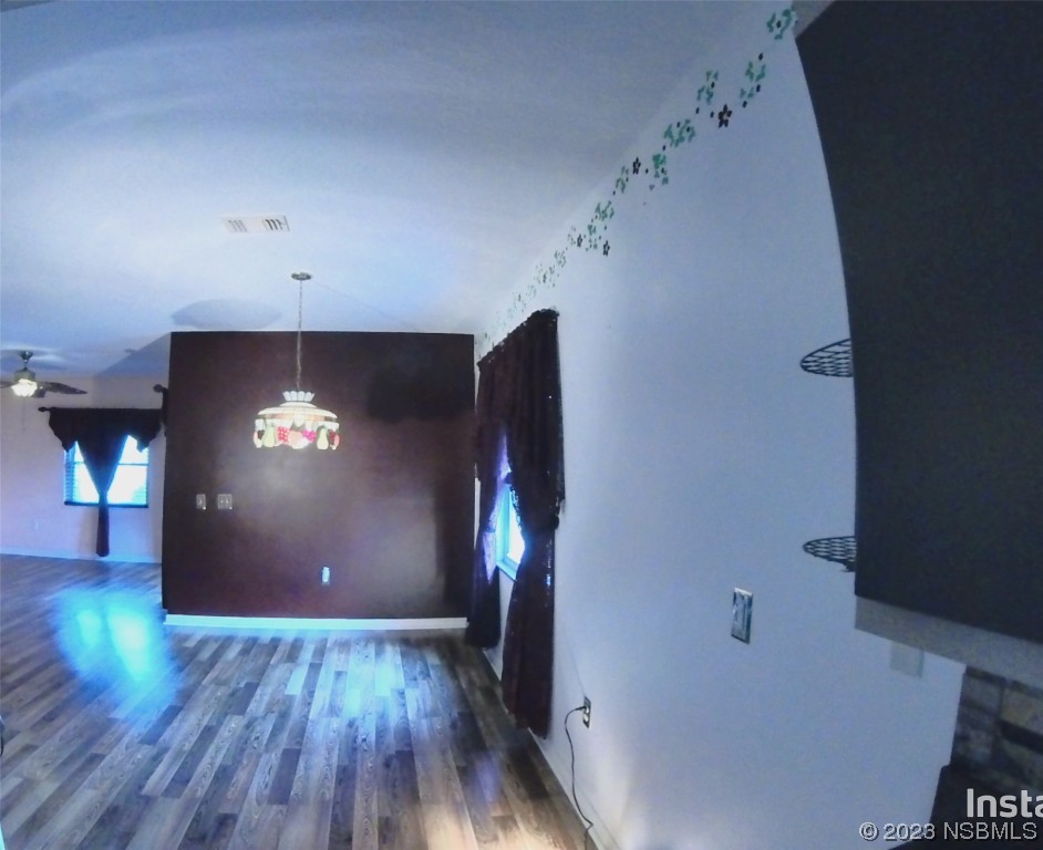 213 Falcon Avenue Edgewater, FL 32141 - Photo 12 of 44 a view of a livingroom with wooden floor