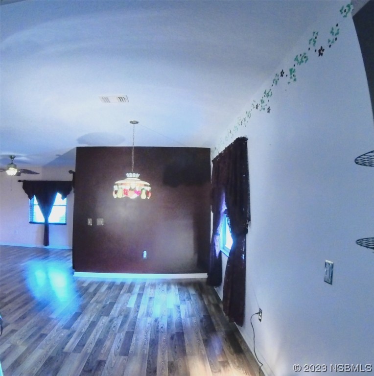 213 Falcon Avenue Edgewater, FL 32141 - Photo 13 of 44 a view of a livingroom with wooden floor