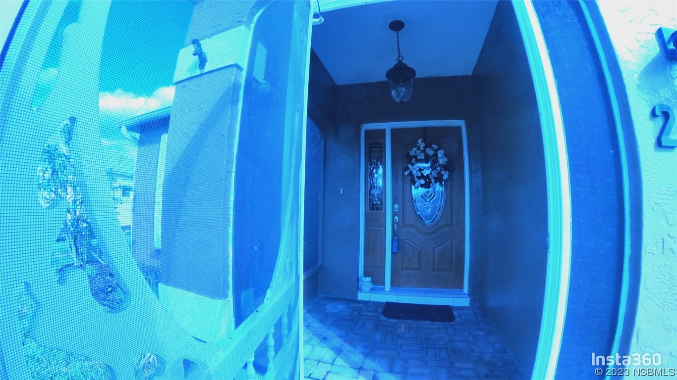 213 Falcon Avenue Edgewater, FL 32141 - Photo 2 of 44 a view of an entryway door
