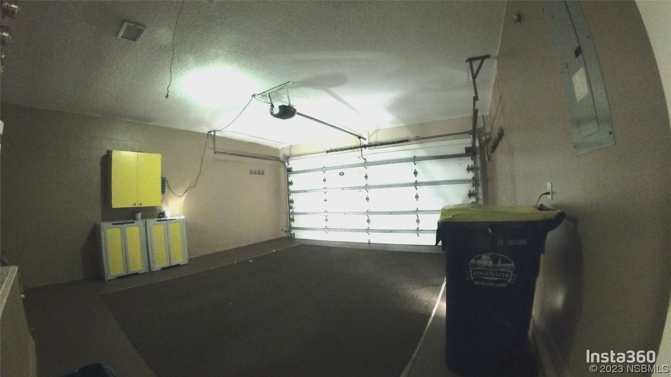 213 Falcon Avenue Edgewater, FL 32141 - Photo 32 of 44 a view of a garage