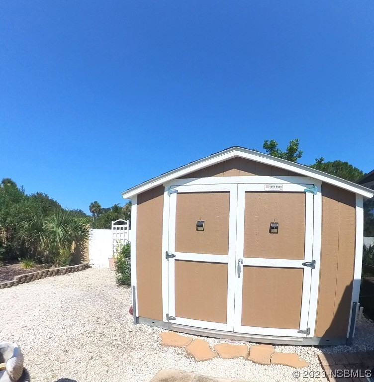 213 Falcon Avenue Edgewater, FL 32141 - Photo 36 of 44 a front view of a house with a yard