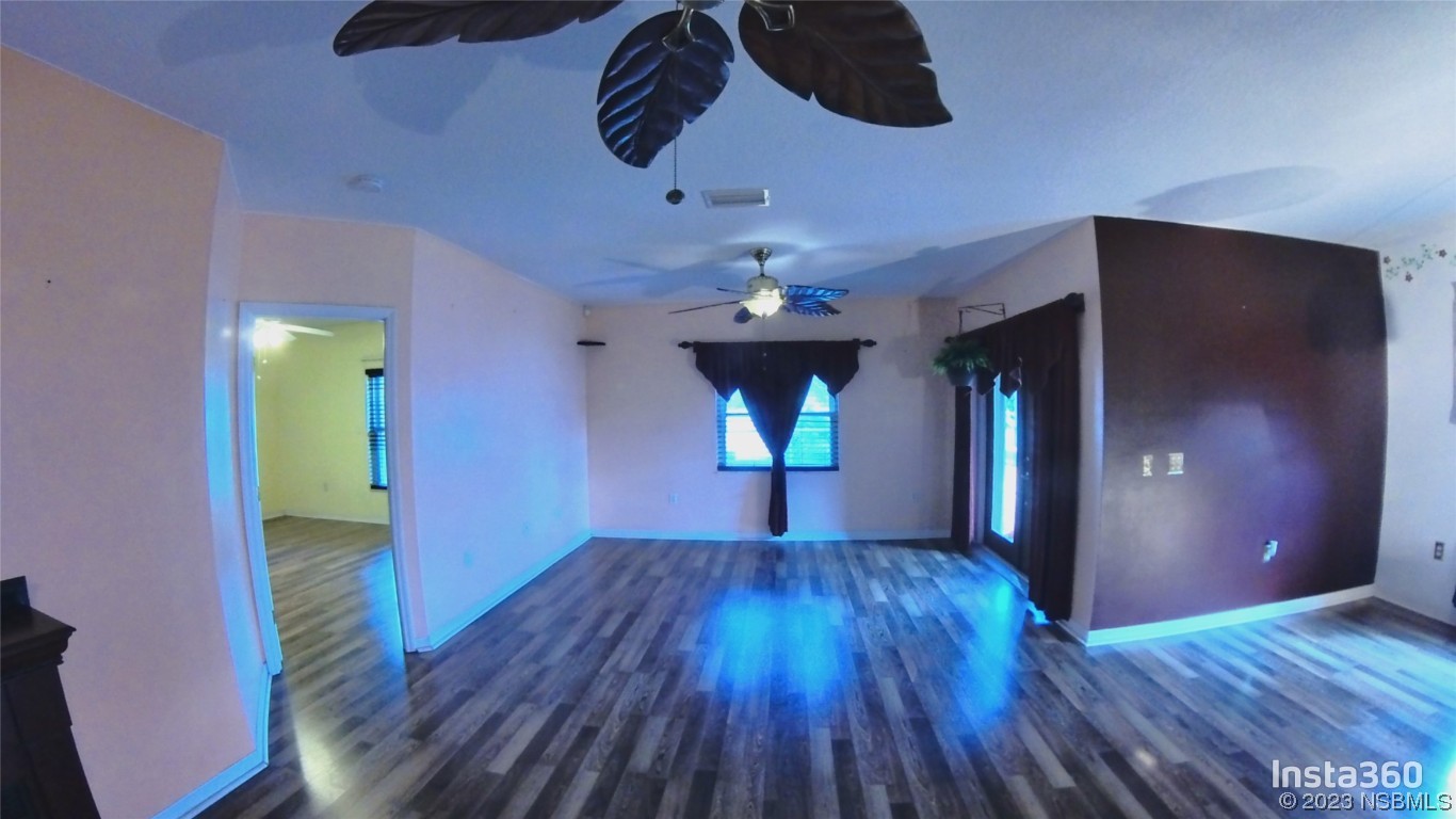 213 Falcon Avenue Edgewater, FL 32141 - Photo 8 of 44 a view of an entryway with wooden floor