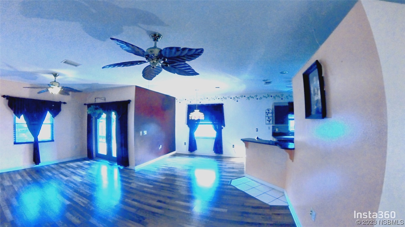 213 Falcon Avenue Edgewater, FL 32141 - Photo 9 of 44 a view of an entryway with wooden floor