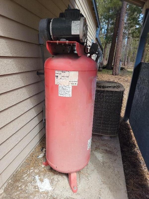1831 Terret Road La Pine, OR 97739 - Photo 46 of 49 large compressor. I believe its 60#. has hose inside the garage for use.