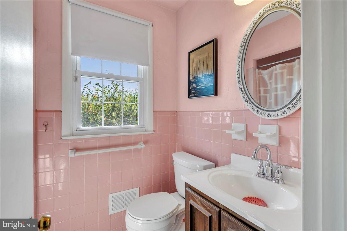 2010 Kynwyd Road Wilmington, DE 19810 - Photo 20 of 33 a bathroom with a sink vanity mirror and toilet