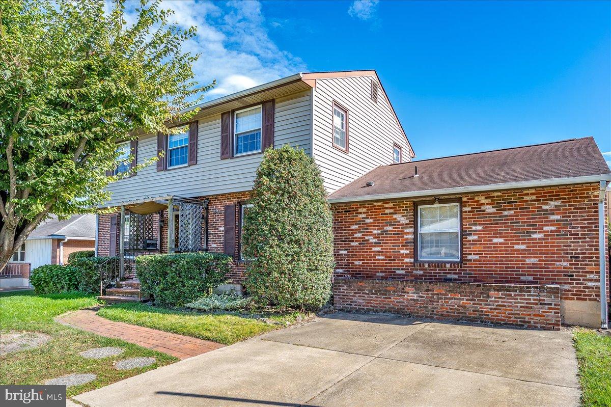 2010 Kynwyd Road Wilmington, DE 19810 - Photo 32 of 33 a front view of a house with garden