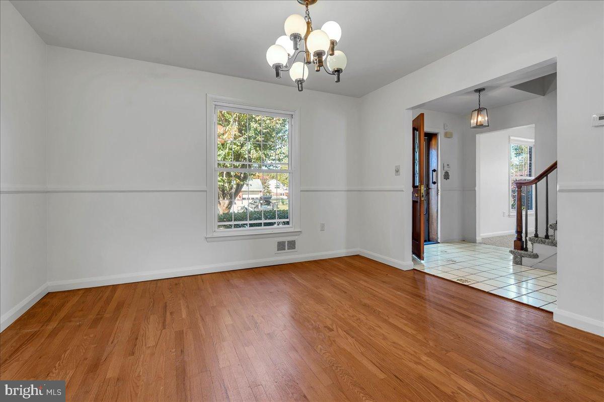 2010 Kynwyd Road Wilmington, DE 19810 - Photo 8 of 33 a view of empty room with wooden floor and window