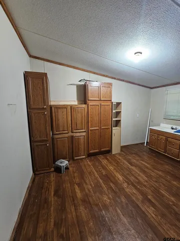 a room with furniture and a fan