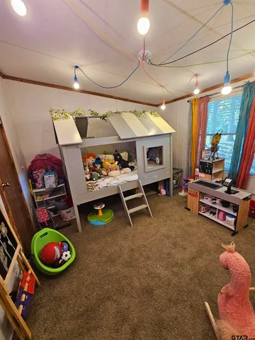 a room with toys and wooden floor