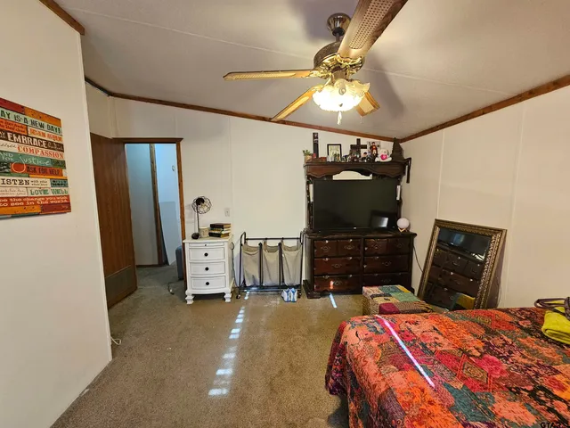 a front view of a house with white walls