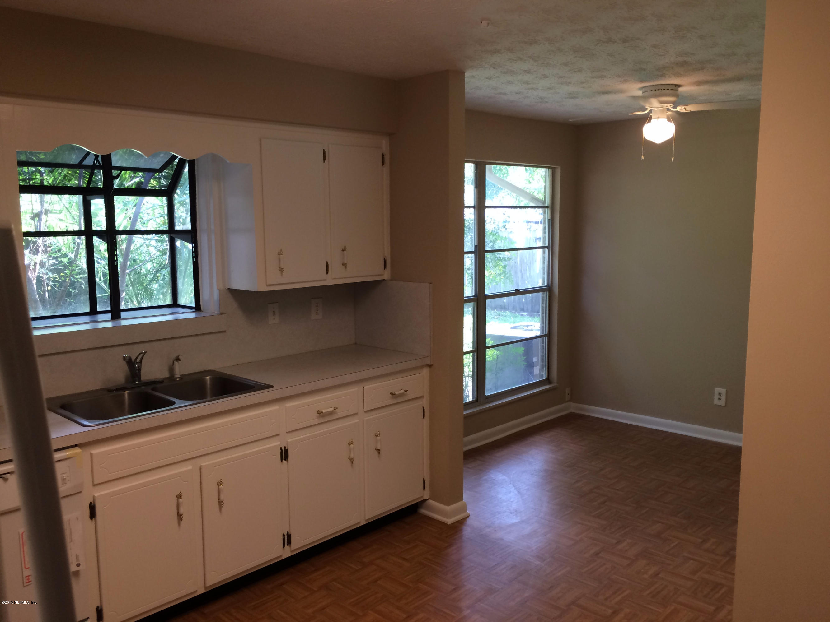 5471 Weaver Road Orange Park, FL 32073 - Photo 12 of 22 a kitchen with sink and cabinets